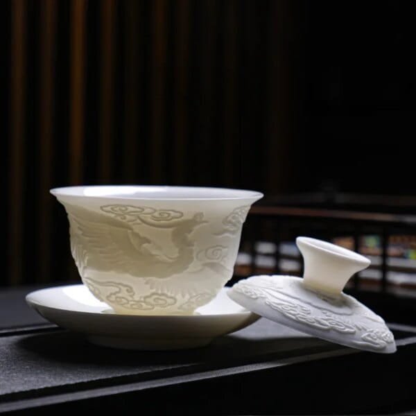 White Porcelain Kung Fu Tea Set White Jade Relief Tureen Ceramic Business Gift Simple Portable Dragon and Phoenix Cups Gaiwan - Image 4