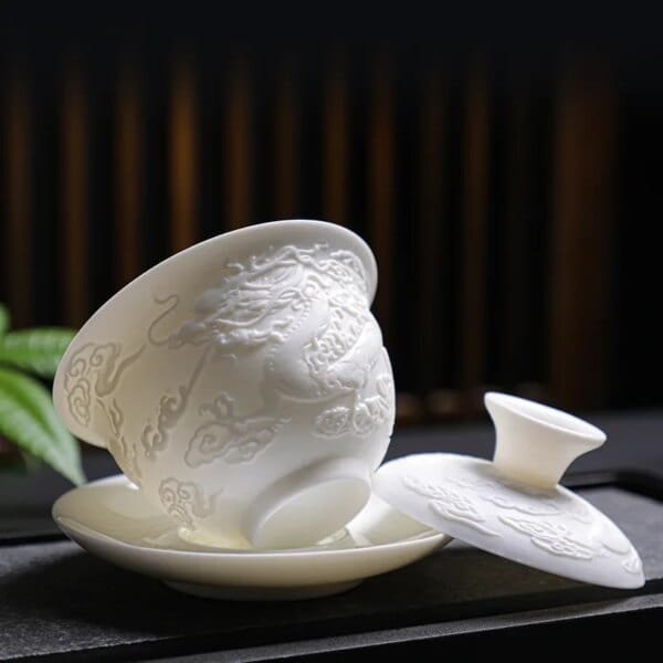White Porcelain Kung Fu Tea Set White Jade Relief Tureen Ceramic Business Gift Simple Portable Dragon and Phoenix Cups Gaiwan - Image 3